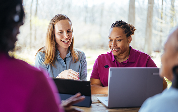A troop running a food drive booth A troop running a food drive booth